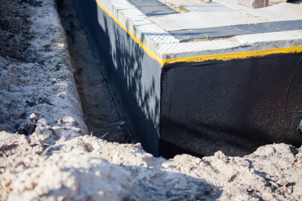 Professional Waterproofing technician working in Chalmers, IN